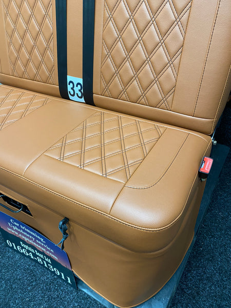 Rock & Roll Bed 3/4 M1 Tested 2 Seater – Gas Assisted Legged, close-up of seat base in brown leatherette with brown Bentley stitching.