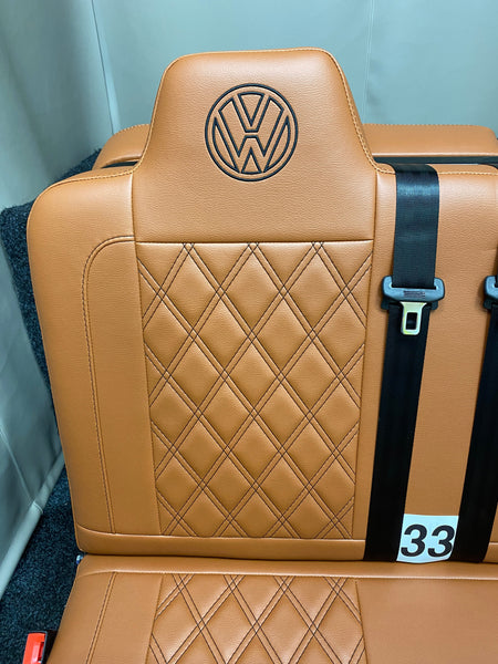 Rock & Roll Bed 3/4 M1 Tested 2 Seater – Gas Assisted Legged, close-up of backrest with brown Bentley stitching and brown VW logo.