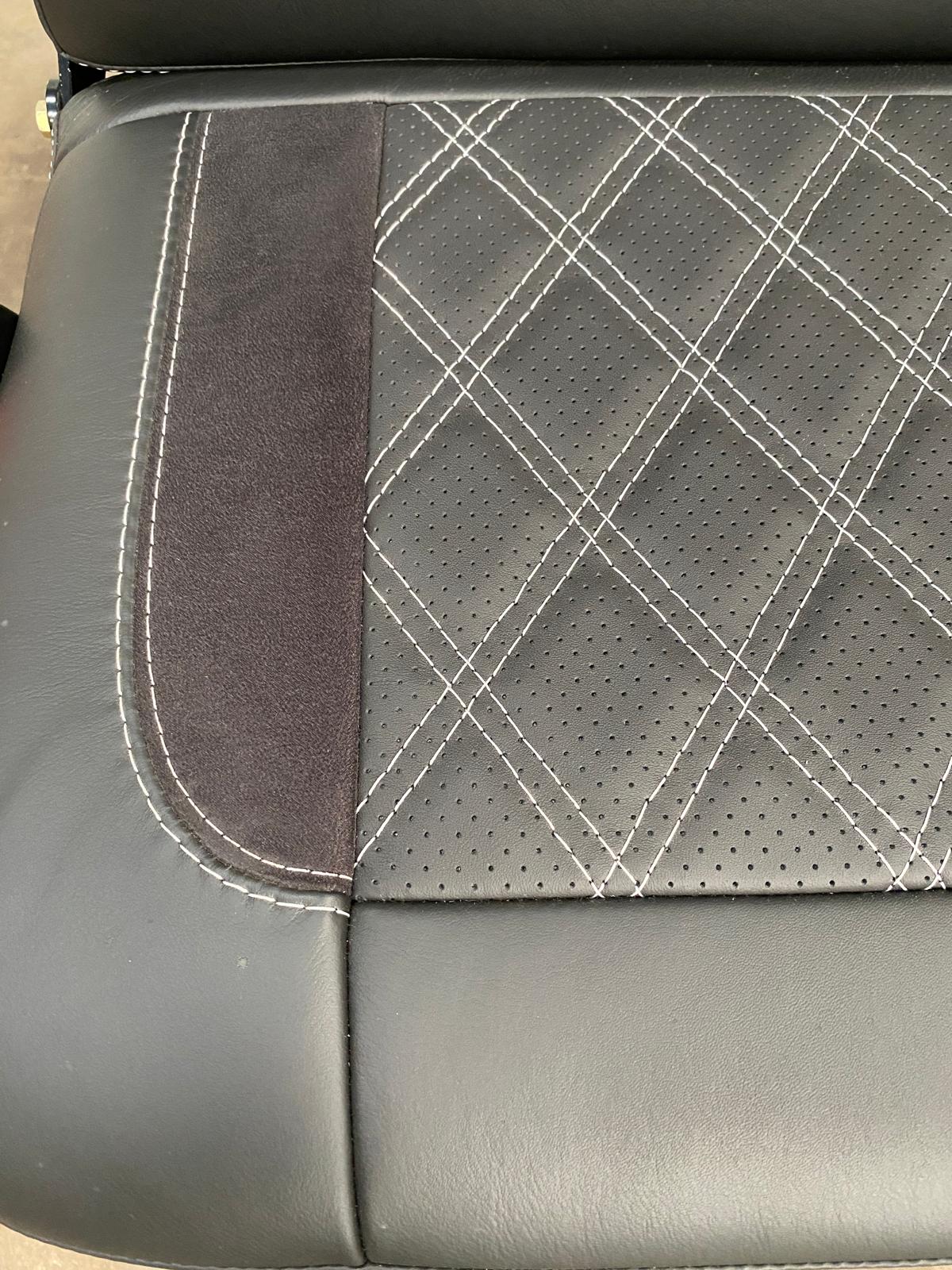 Rock & Roll Bed 3/4 Size M1 tested Legless Gas Assisted, close-up of perforated leather with Alcantara insert and light grey Bentley stitching.