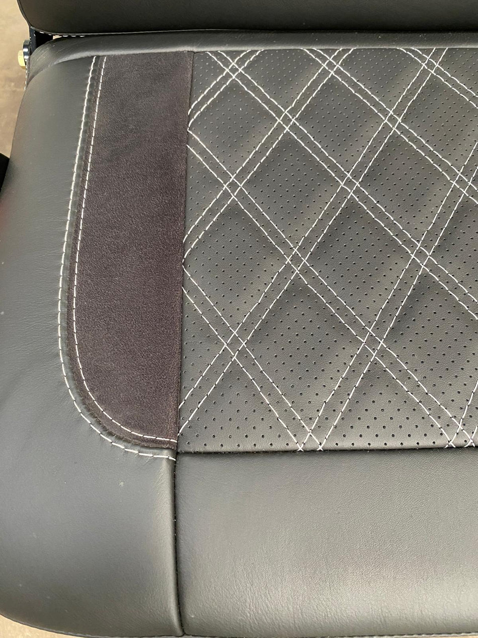 Rock & Roll Bed 3/4 Size M1 tested Legless Gas Assisted, close-up of perforated leather with Alcantara insert and light grey Bentley stitching.