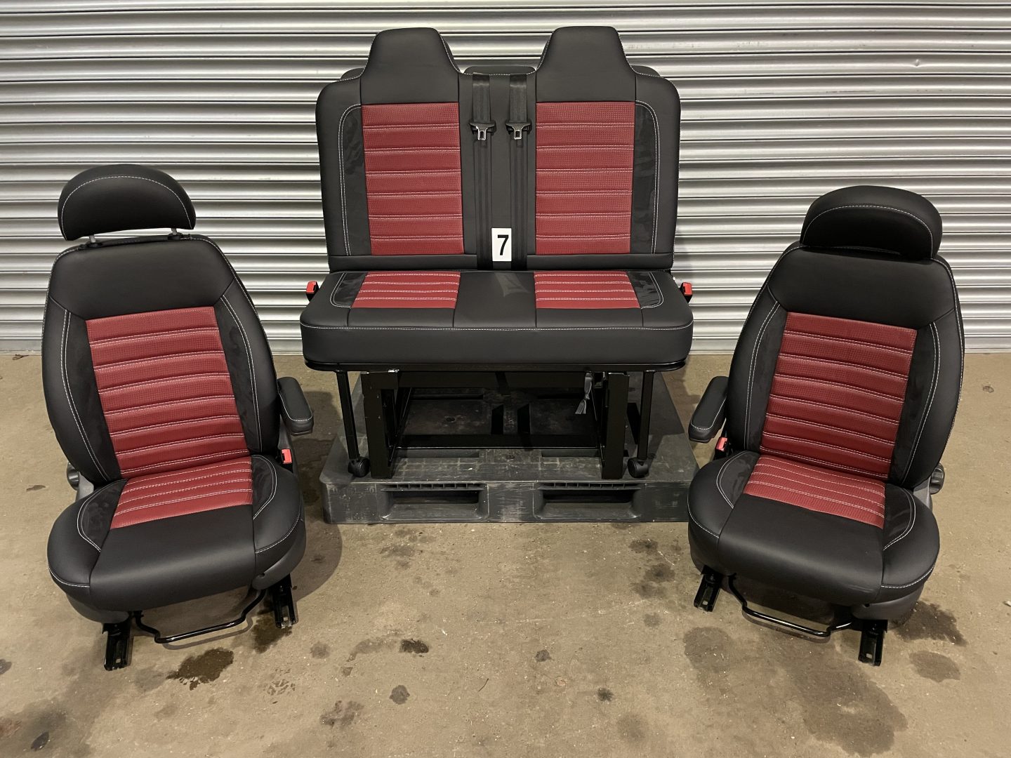 Rock & Roll Bed M1 Tested gas Assisted and Pair of MK2 Swivel Replacement Captain Seats in black Nappa real leather with perforated red centre panels and red stitch pattern.