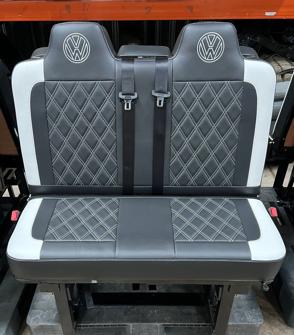 Rock & Roll Bed Seater 2 – Legless, front view showing black leatherette with white Bentley stitching, white edges, and VW logos on headrests.