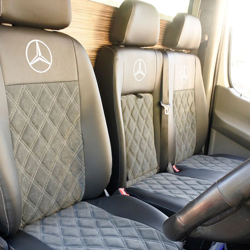 Sprinter, Crafter,  MAN TGE - Front Seats in black leatherette with updated micro fibre centre panels with white stitching and white Mercedes logos.