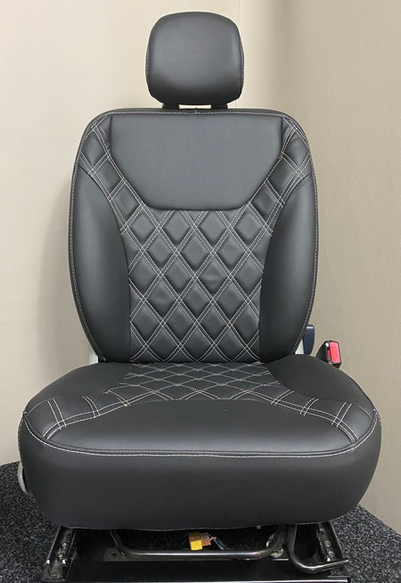 TVP Trafic Vivaro Primastar driver seat in black leatherette upholstery with white Bentley stitching and matching black centre panel.