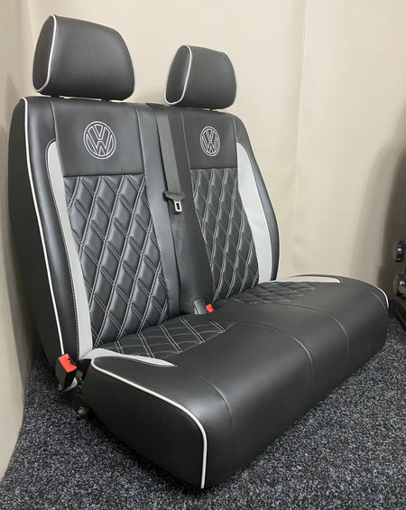Volkswagen Crafter double front seat in black leatherette with light grey piping, Bentley stitching and VW logos.