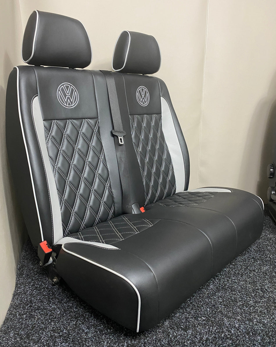 Volkswagen Crafter double front seat in black leatherette with light grey piping, Bentley stitching and VW logos.