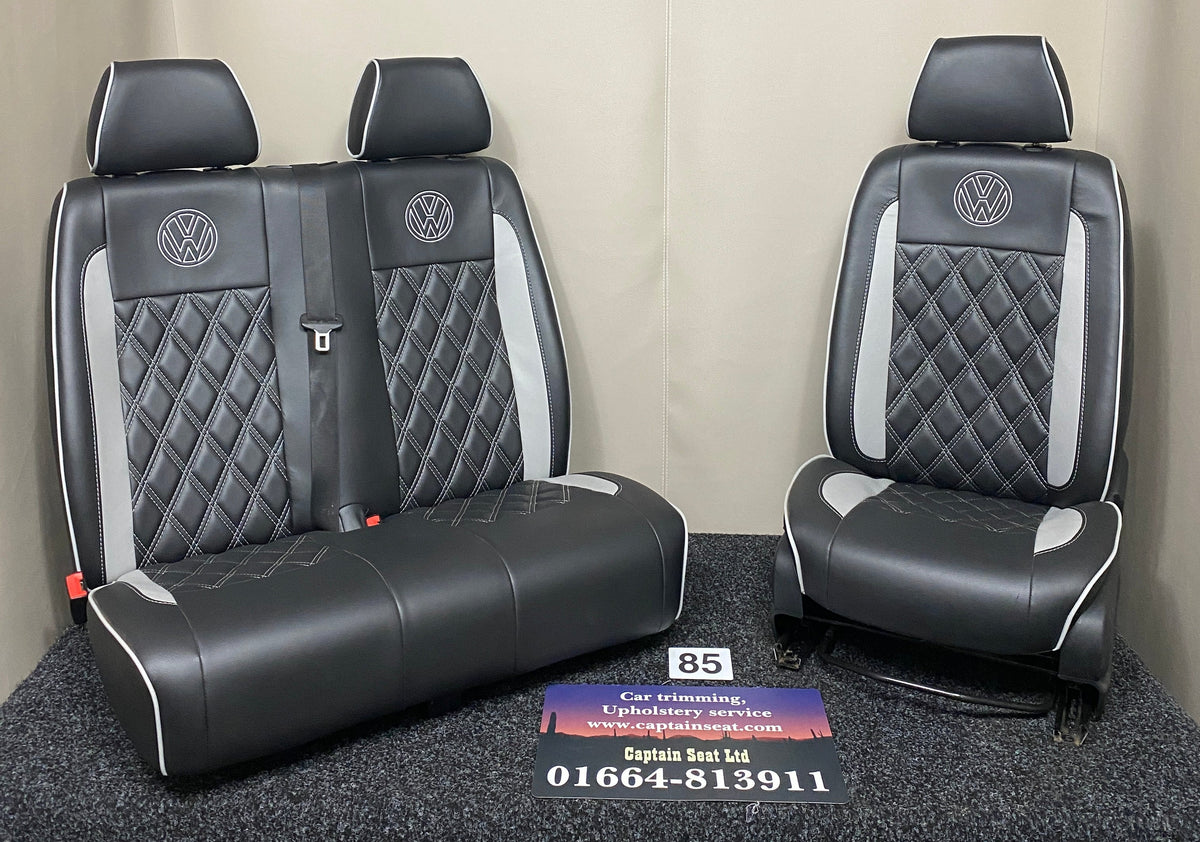 Volkswagen Crafter front seats in black leatherette with grey Bentley stitching, light grey inserts and VW logos.