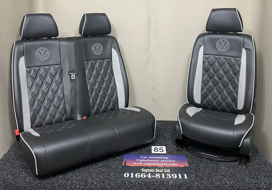 Volkswagen Crafter front seats in black leatherette with grey Bentley stitching, light grey inserts and VW logos.