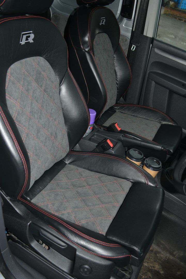 VW Caddy Seats Upholstery (VW-CADDY-05), black real leather with grey faux suede centre panels.