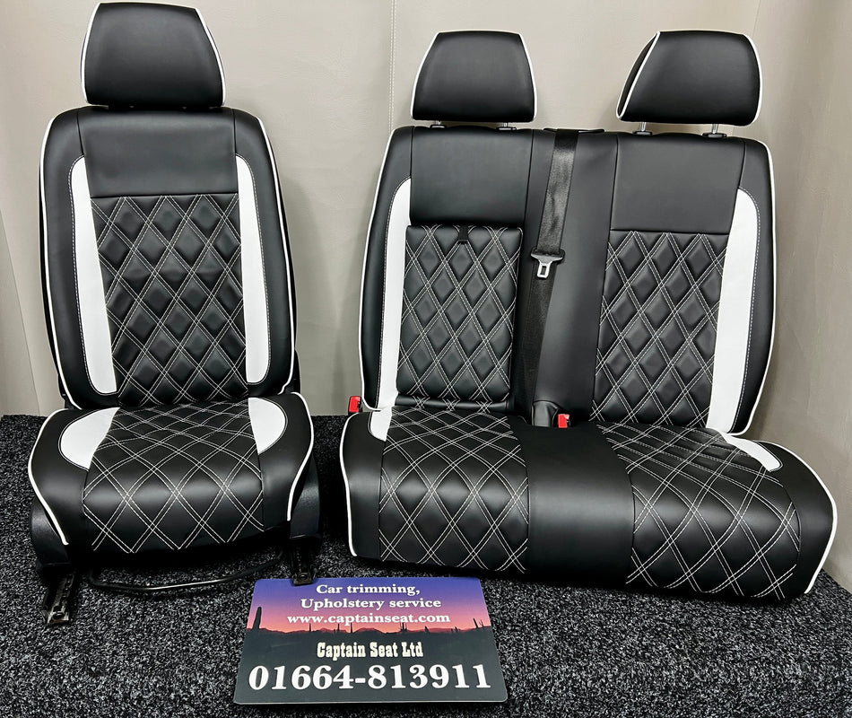 VW Crafter Mercedes Sprinter front seats in black leatherette, White inserts, Bentley stitch pattern also White.