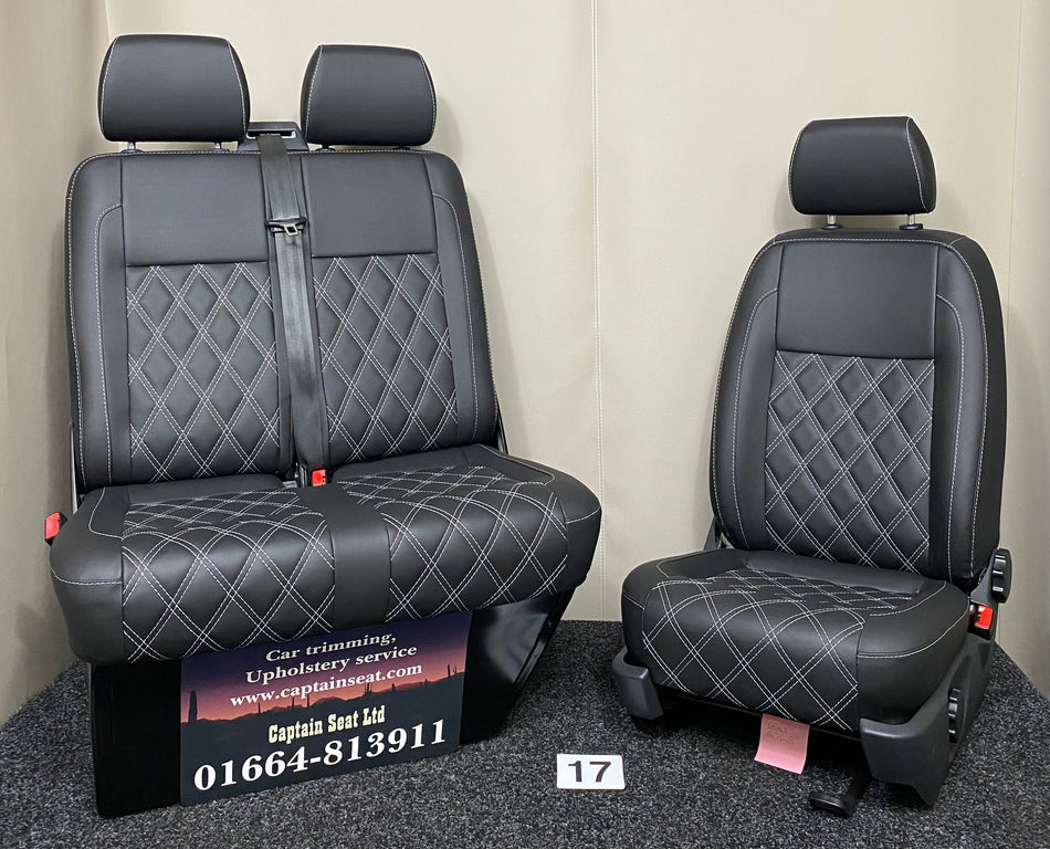 VW Factory Front Seats T5 T6 – full view of black leatherette with white Bentley full stitching and dark grey plastic trim.
