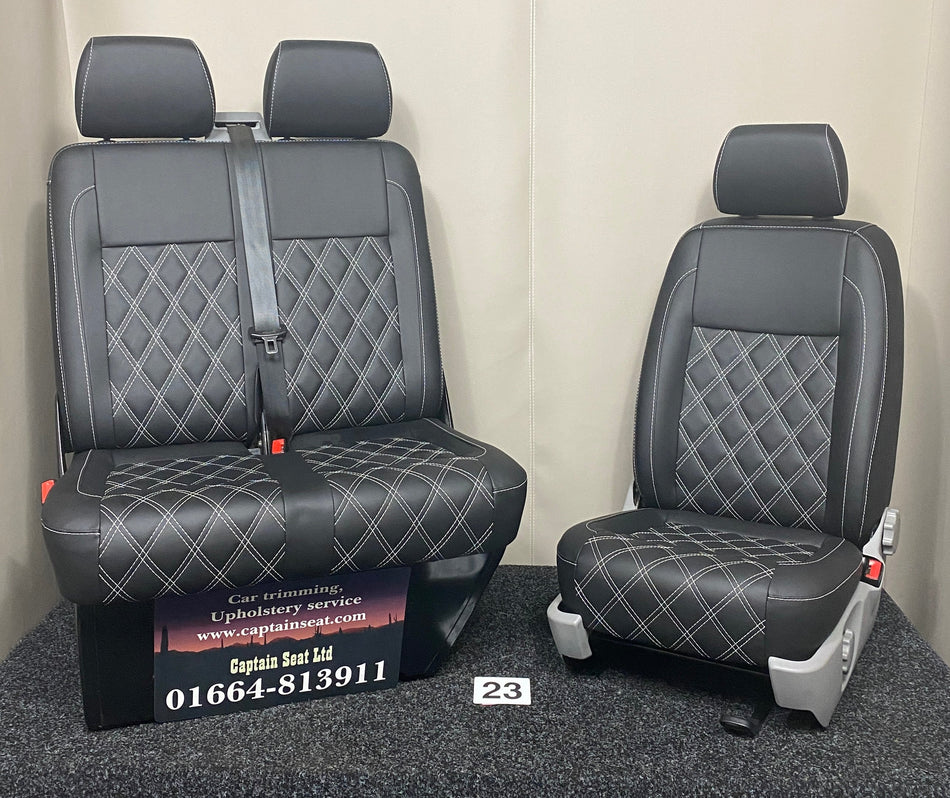 VW Factory T5 T6 front seats in black leatherette with full Bentley cross stitching and dark grey plastic trim.