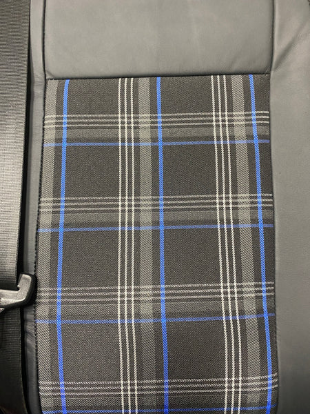 VW Factory T5 T6 Front Seat, close-up of black real leather and blue tartan centre panel.