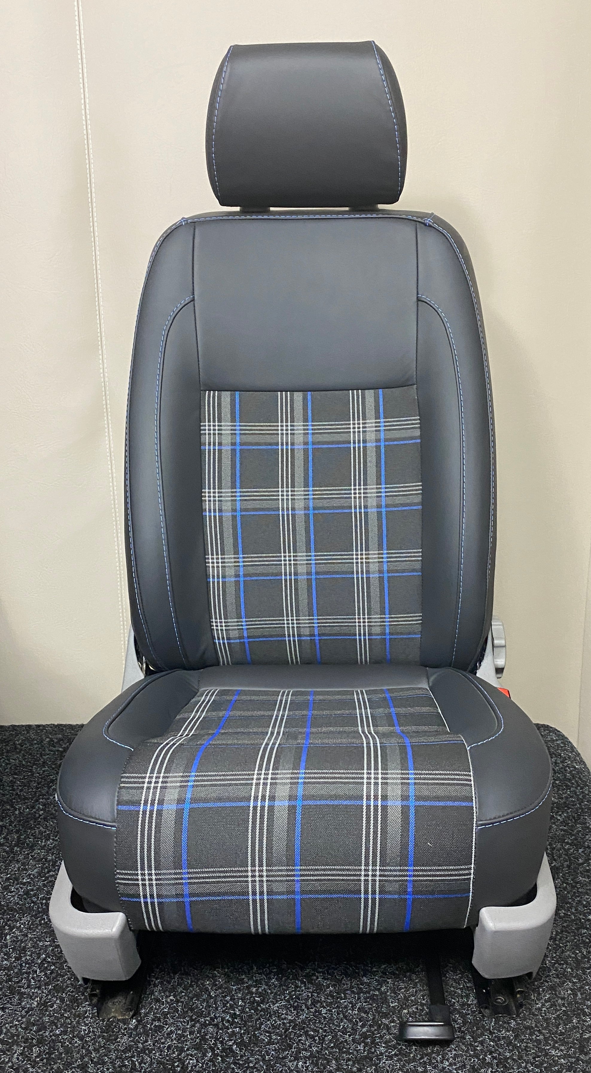VW Factory T5 T6 Driver Seat with black real leather edge panels, blue tartan centre panel and blue stitching.