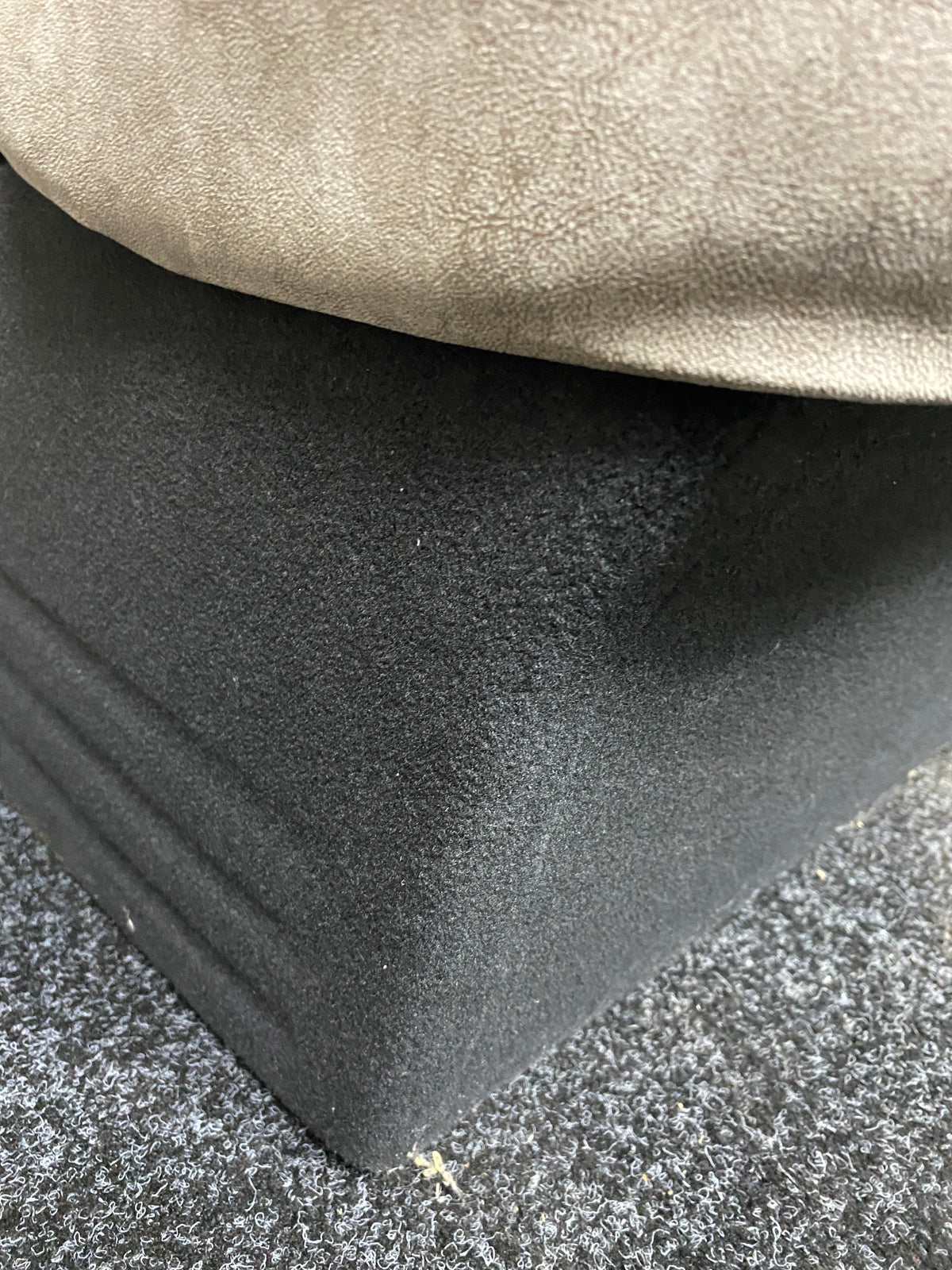 VW Factory T5 T6 Front Seat, close-up of the dark grey base.