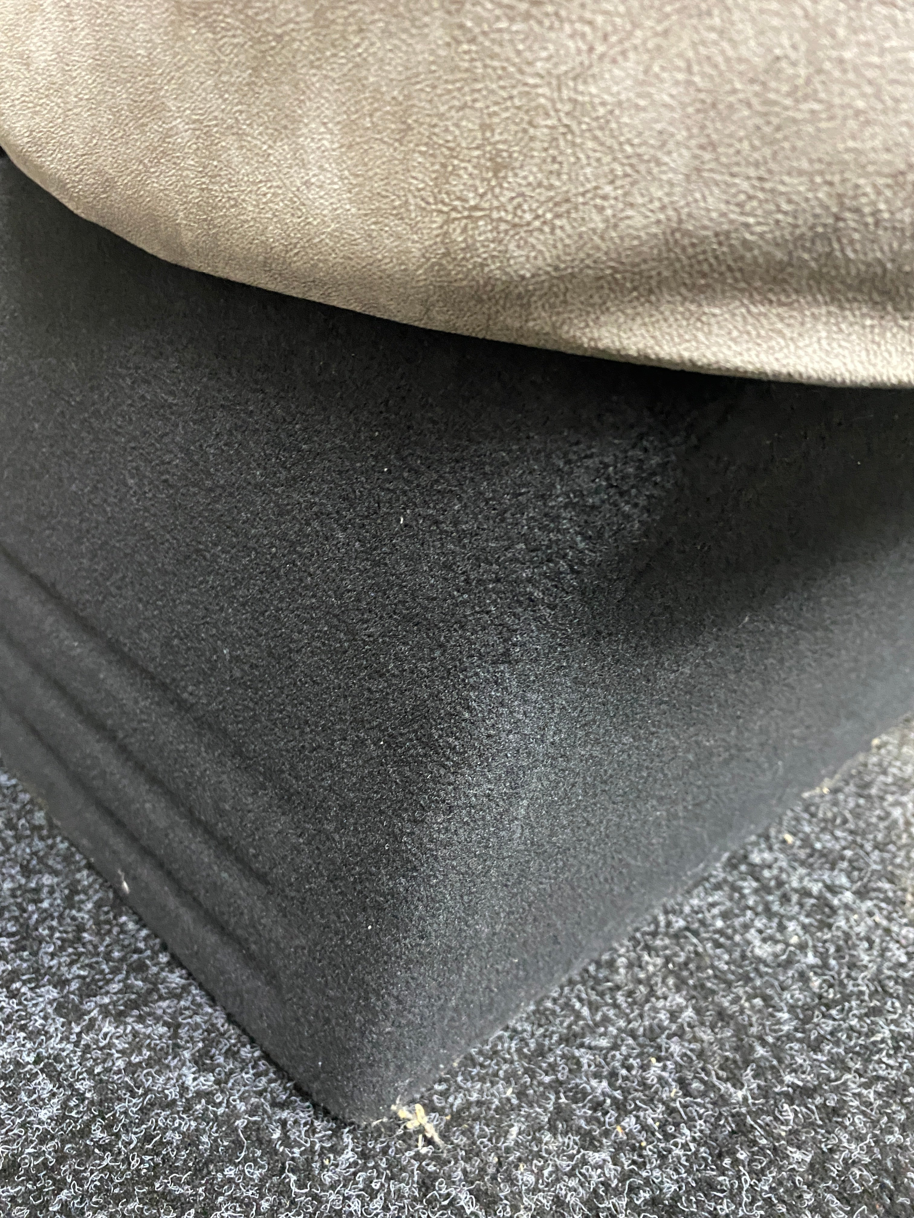 VW Factory T5 T6 Front Seat, close-up of the dark grey base.