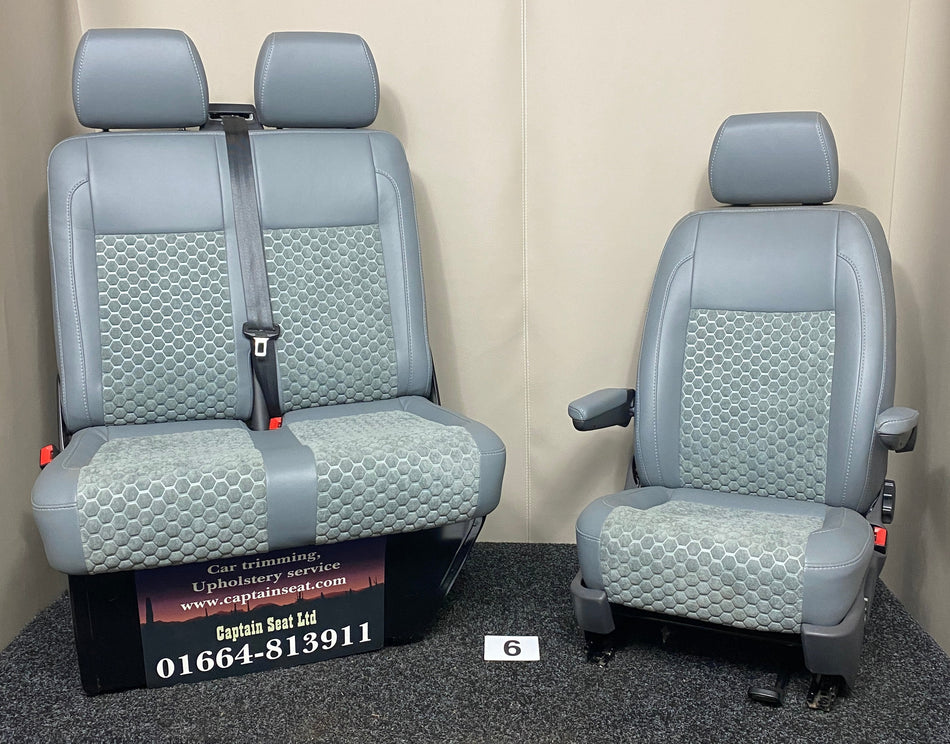 VW Factory Front Seats T5 T6 in grey leatherette with grey fabric honeycomb centre panels and grey stitching. 2+1 seating configuration with dark grey plastic trim.