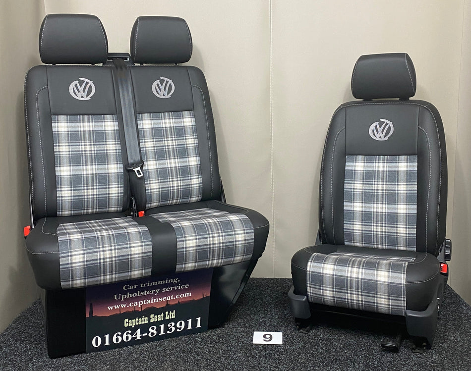 VW Factory T5 T6 Front Seats in black leatherette with light brown tartan centre panels. Features graffiti VW logos on the backrests, grey stitching and ark grey plastic trim.