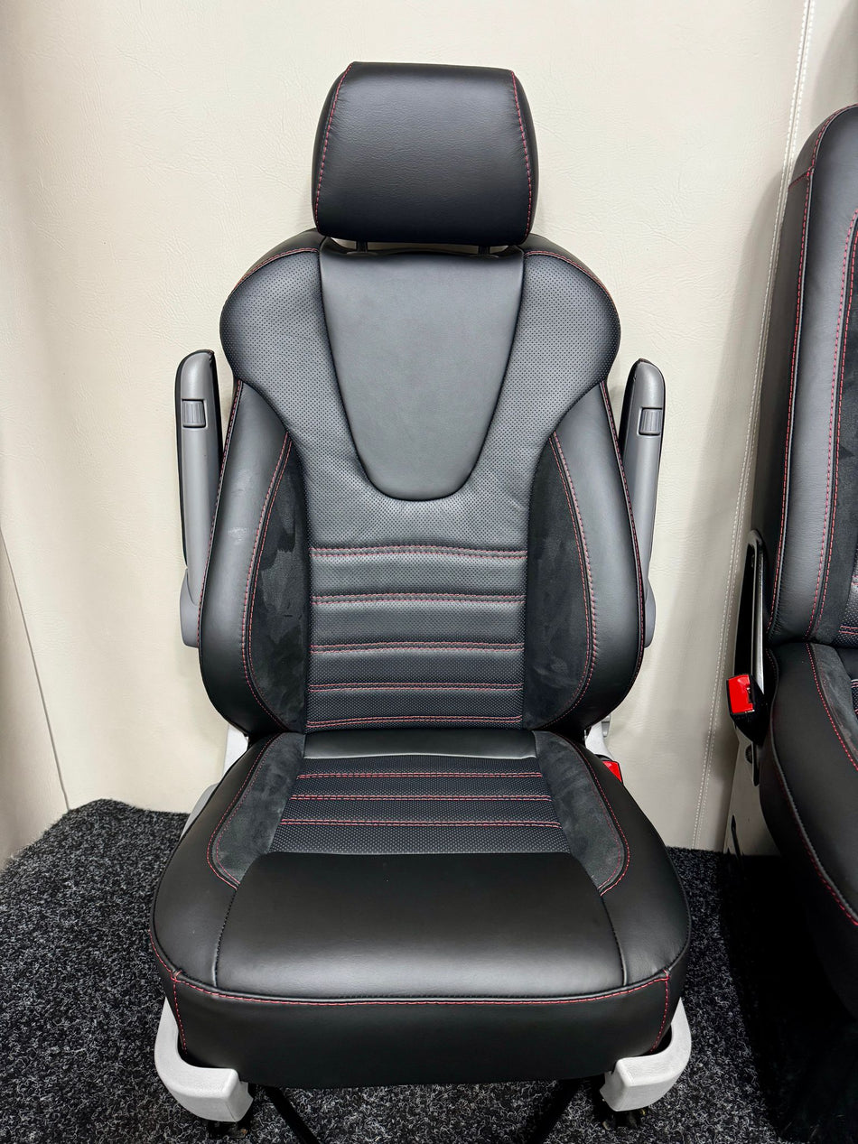 VW Factory T5 T6 driver seat with black Nappa leather, perforated centre panel, black Alcantara inserts, armrests and red stitching.