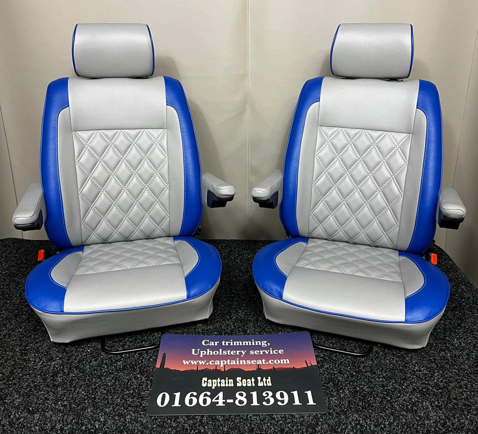 VW T4 Front Seats in white leatherette upholstery with blue edge panels and diamond stitching.