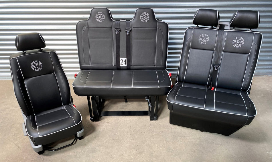 vw t5 t6 front seats + m1 tested gas assisted rock and roll bed.