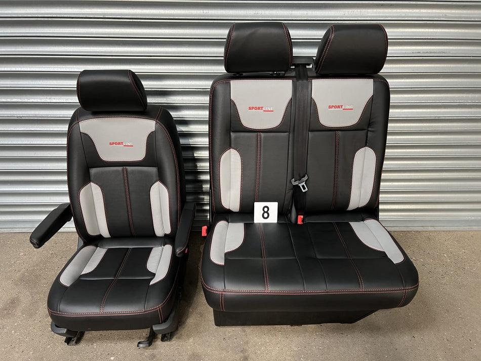 VW T5 T6 sportline front seats upholstered in black leatherette with light grey inserts and Sportline logos.
